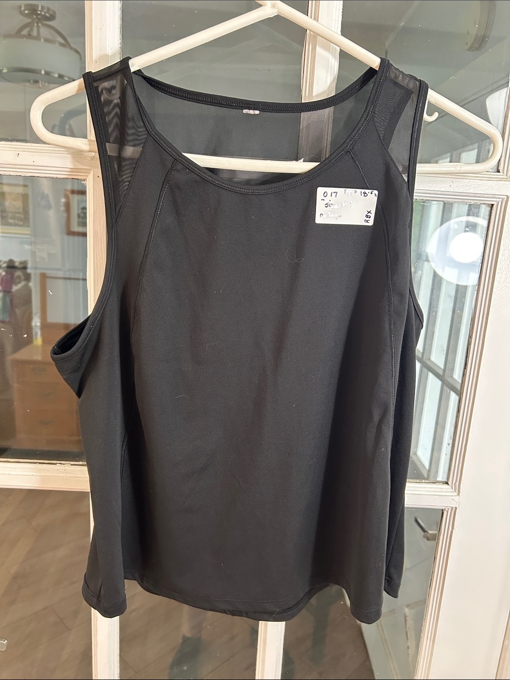 O17. Black Women’s Mesh-Panel Tank Top